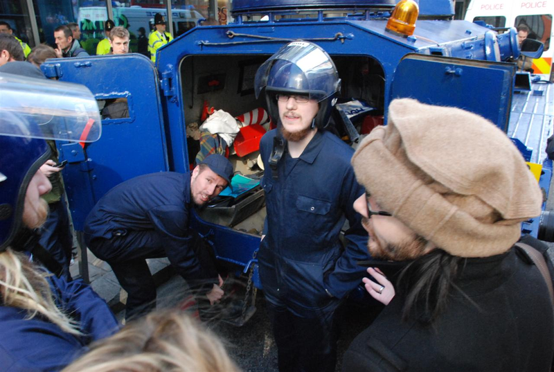 Illustration for article titled Vigilante Hippie Six-Wheeled Riot Tank Tries To Battle G20 Summit Protesters